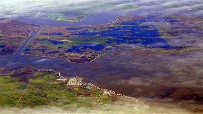 خبير يحذر من اختفاء مدينتي الإسكندرية ودمياط وغرق الدلتا بسبب التغيرات المناخية 