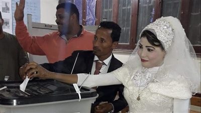 عروسان يدليان بصوتيهما على تعديل الدستور قبل غلق لجان الاقتراع بقنا