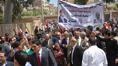 مسيرة بالأعلام تجوب شوارع بلقاس للحث على المشاركة في الاستفتاء (صور)