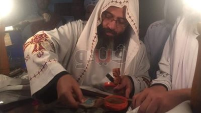 15 صورة ترصد طقوس احتفالات كنيسة مارجرجس بعيد القيامة في قنا