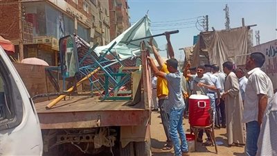 غلق وتشميع ٥ محلات مخالفة وتحرير ٣٥ محضر إشغال بالعياط| صور