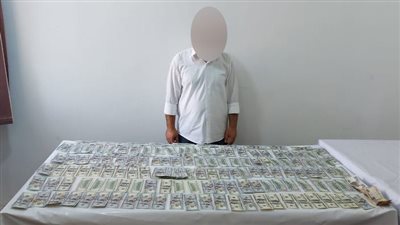 ضبط سمسار للإتجار غير المشروع في النقد الأجنبي