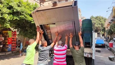 تشميع محلين ورفع 373 حالة إشغال وتجريد ورفع مخلفات بحى العجوزة | صور