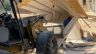 إزالة كشكين مخالفين بشارع عشرة في بولاق الدكرور | صور