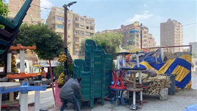 10 صور ترصد إزالة إعلانات وأسقف مخالفة في حملة بجنوب الجيزة