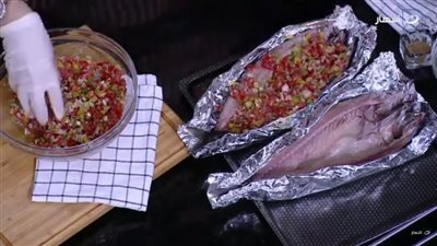 لعشاق السي فود.. طريقة جديدة لعمل سمك المكاريل السنجاري| فيديو 