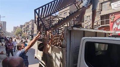 إزالة أكشاك مخالفة ورفع 300 حالة إشغال ببولاق الدكرور | صور