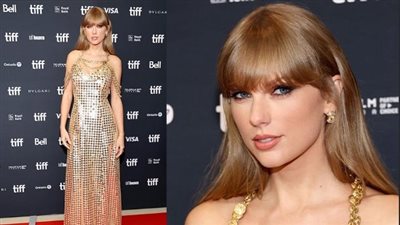 تايلور سويفت تتألق بفستان ذهبي بمهرجان تورنتو في حفل عرض فيلمها| صور
