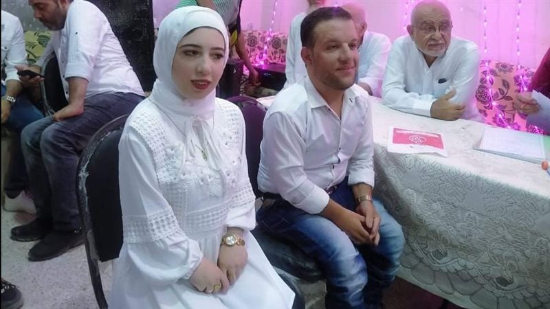 حسين وأسماء عروسين