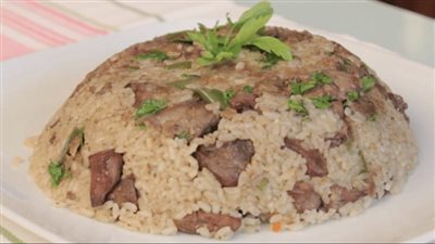 طريقة مبتكرة.. تعرفي على طريقة عمل الأرز بالكبدة والتمر هندي |فيديو 