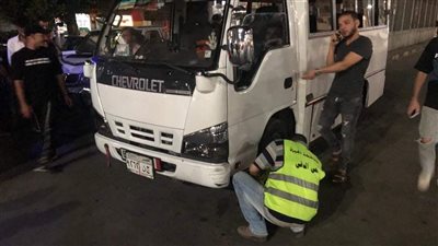 حملات مكبرة بالجيزة لضبط السيارات المخالفة | صور