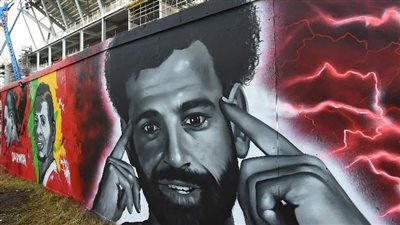ليفربول يبرز صورة محمد صلاح على جدران ملعب أنفيلد | صور