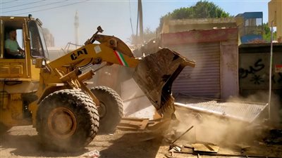 رصف وتطوير عدد من الشوارع في الجيزة | صور