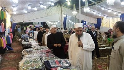 الجيزة توزع أدوات مدرسية على الأيتام بحي الهرم | صور