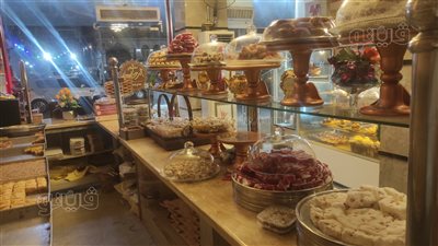 عروسة جديدة.. محال دمياط تتنافس على جذب الزبائن لشراء حلاوة المولد l فيديو