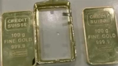 ضبط سبائك ذهبية وترامادول بحوزة راكبين بمطار القاهرة | صور