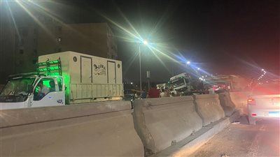 المرور يرفع آثار حادث الطريق الدائري تمهيدا لفتح الطريق | صور 