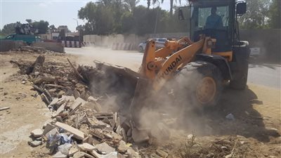 رفع ٨٥٠ طنا من المخلفات والرتش بطريق المنصورية في أبو النمرس|صور