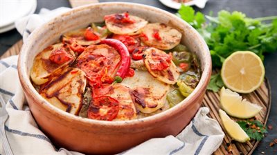 طريقة عمل طاجن السمك بالمكرونة والأرز|فيديو 