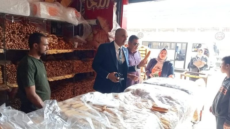 رئيس حي الدقي يقود