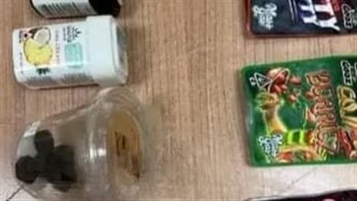 ضبط محاولة تهريب أكياس ماريجوانا وعلب حلوى مخلوطة بالمخدرات في مطار القاهرة