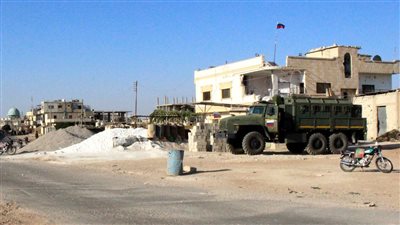 بدء تسليم أسلحة وتسوية أوضاع عدد من مسلحي درعا بسوريا