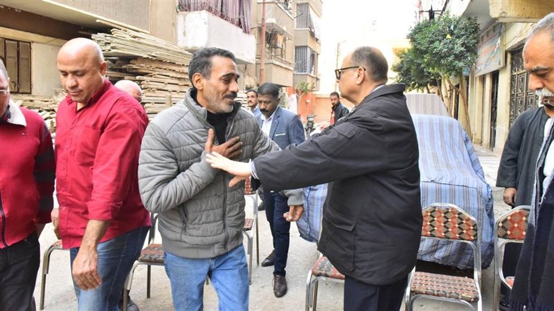محافظ أسيوط ووالد