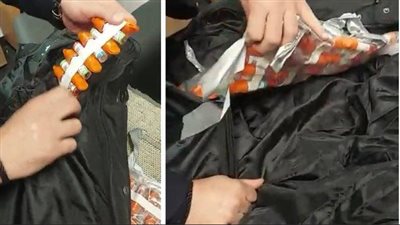إحباط محاولة تهريب مستلزمات طبية بمطار القاهرة، والسر انتفاخ الجاكيت (صور)