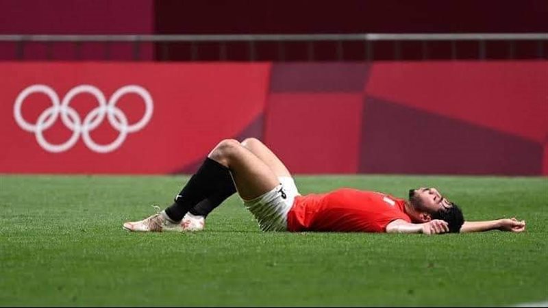 أكرم توفيق لاعب الفريق
