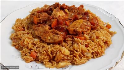 طريقة عمل طاجن لسان عصفور بالفراخ (فيديو)