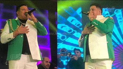 حمو بيكا بإطلالة غريبة في حفل رأس السنة، بدلة أبيض في أخضر (فيديو وصور)