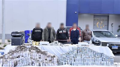 ضبط عصابة تقليد العملات الوطنية والأجنبية بالجيزة