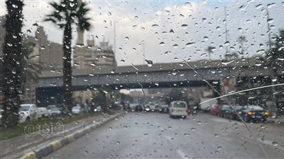 سقوط أمطار خفيفة على عدد من المناطق في الجيزة ( صور) 
