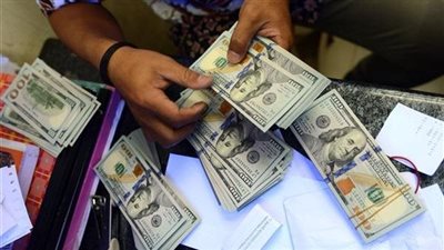 ضبط شخص لاتجاره فى النقد الأجنبى بالأزبكية 