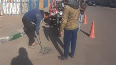 صيانة شبكات صرف الأمطار وأعمدة الإنارة بحي ثان الإسماعيلية