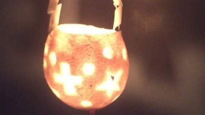 عيد الغطاس، بالبرتقال والشموع مسيحيو الأقصر يحتفلون بالعيد (صور)