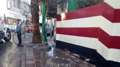 غسيل ميدان الشهيد أحمد جلال بحي شرق أسيوط 