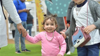 أطفال معرض الكتاب 2023، ضحك ولعب وفرحة (صور)