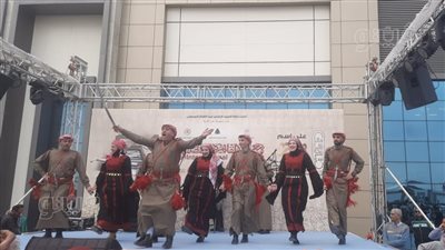 رقصة الدبكة الأردنية تُبهر زوار معرض القاهرة الدولي للكتاب