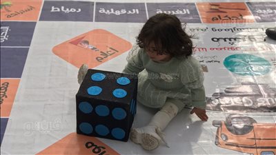 معرض الكتاب، بلعب السلم والثعبان وأوتوبيس المدرسة يستمتع الأطفال بوقتهم (صور) 