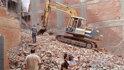 18 صورة ترصد انتهاء أعمال إزالة العمارة المائلة في المنصورة 