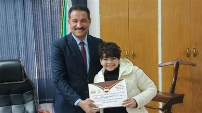 وكيل تعليم الجيزة يحقق أمنية طالب مصاب بالتوحد (صور)