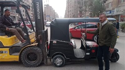 التحفظ على 14 مركبة توك توك وإزالة سور مخالف بالجيزة (صور)