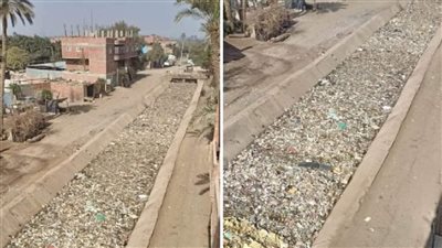 رفع مخلفات متراكمة بأحد المصارف في أبو النمرس بالجيزة 