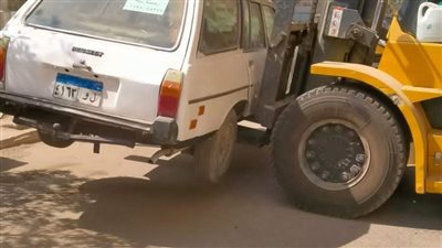 الجيزة اليوم، رفع السيارات المتهالكة بحي بولاق الدكرور(صور)