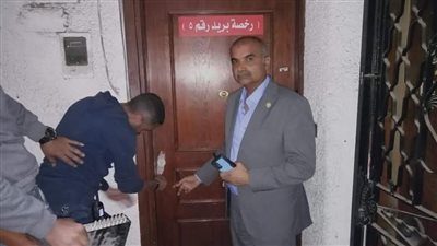 غلق وتشميع شركة شحن  تعمل دون ترخيص بالدقي (صور)