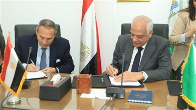 تسوية الملفات العالقة بين محافظة الجيزة وبنكي مصر والأهلي (صور)