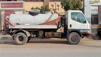 نشر معدات سحب المياه في جميع أحياء الجيزة لمواجهة الأمطار (صور)