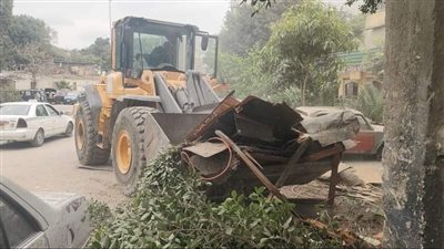 إزالة التعديات على الطريق العام بشارع المحطة بحي شمال الجيزة (صور)