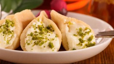 طريقة عمل قطايف بالقشطة من الشيف نجلاء الشرشابي (فيديو)